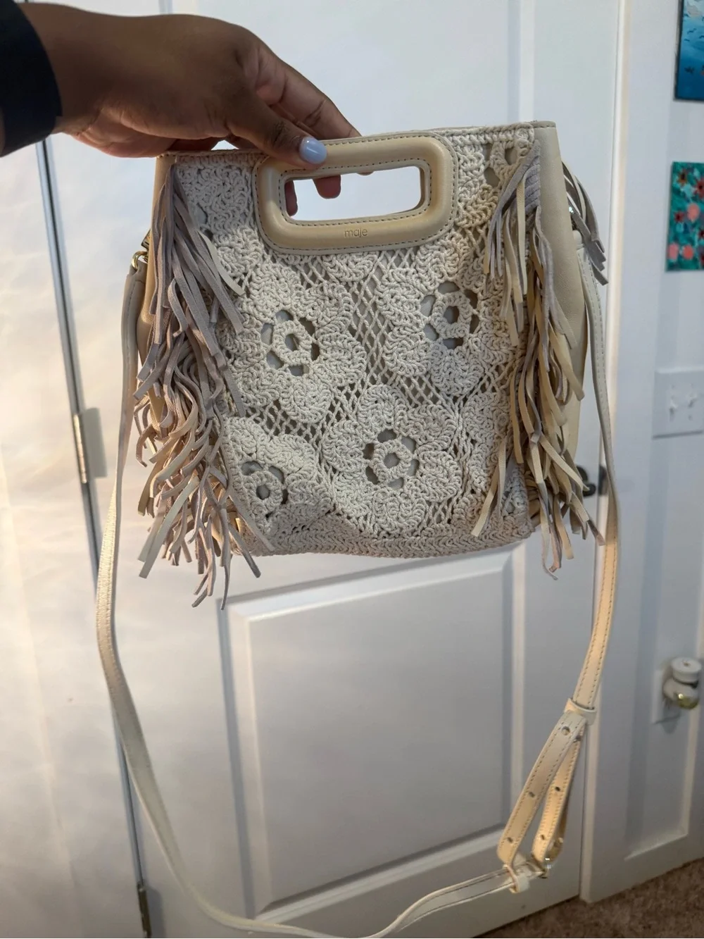 Maje Crochet-Knit Crossbody Bag in Cream with Fringe
